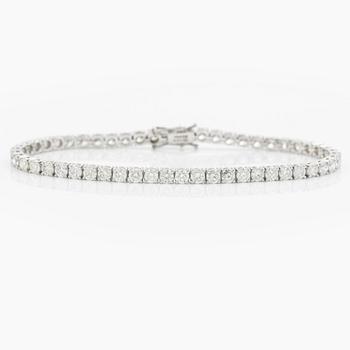 Tennis bracelet 18K white gold with round brilliant-cut diamonds, a total of 6.42 ct.