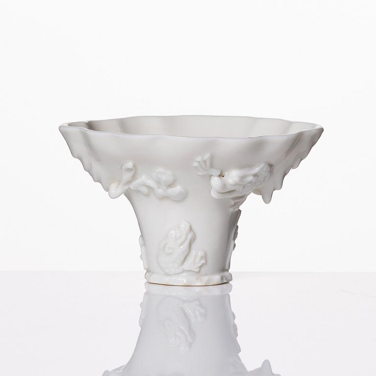 A Chinese blanc de chine libation cup, Qing dynasty, Kangxi (1662-1722).