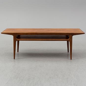 A 1960s teak coffee table.