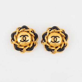 Chanel,  a pair of gold tone clip-on earrings, 1994.