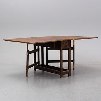 A 19th Century painted gate leg table.