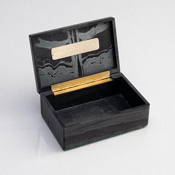 Atelier Borgila, writing set, 4 pieces, sterling silver and iron ore, Stockholm 1965.