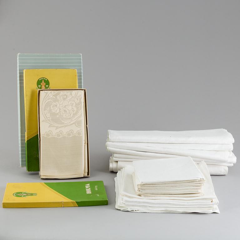 Seven table cloths and 26 napkins, mostly linen, first half of the 20th Century.