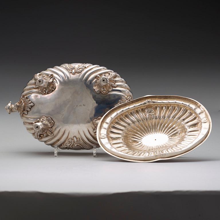 A pair of English mid 18th century silver tureens, marks of Frederick Kandler, London 1755.