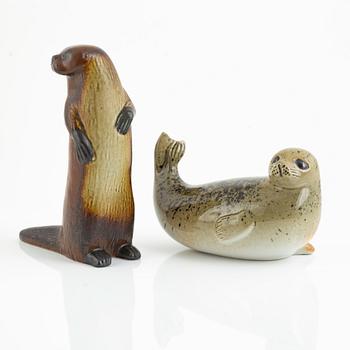 Lisa Larson, two figurines, 'Utter' and 'Gråsäl' for Nordiska Kompaniet in collaboration with WWF, Gustavsberg.