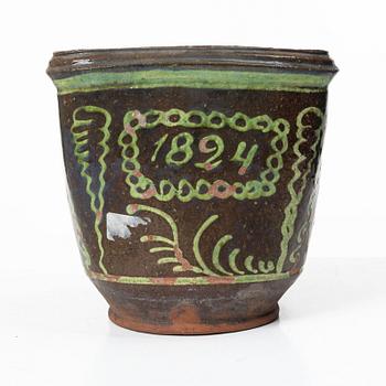 Stoneware planter and stand, dated 1824.