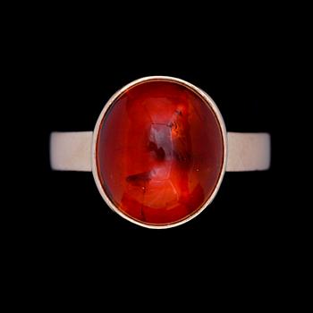 RING, 18k guld med cabochonslipad orange sten trol citrin. GSF, Sverige, 2008. Tot vikt 9,9g.