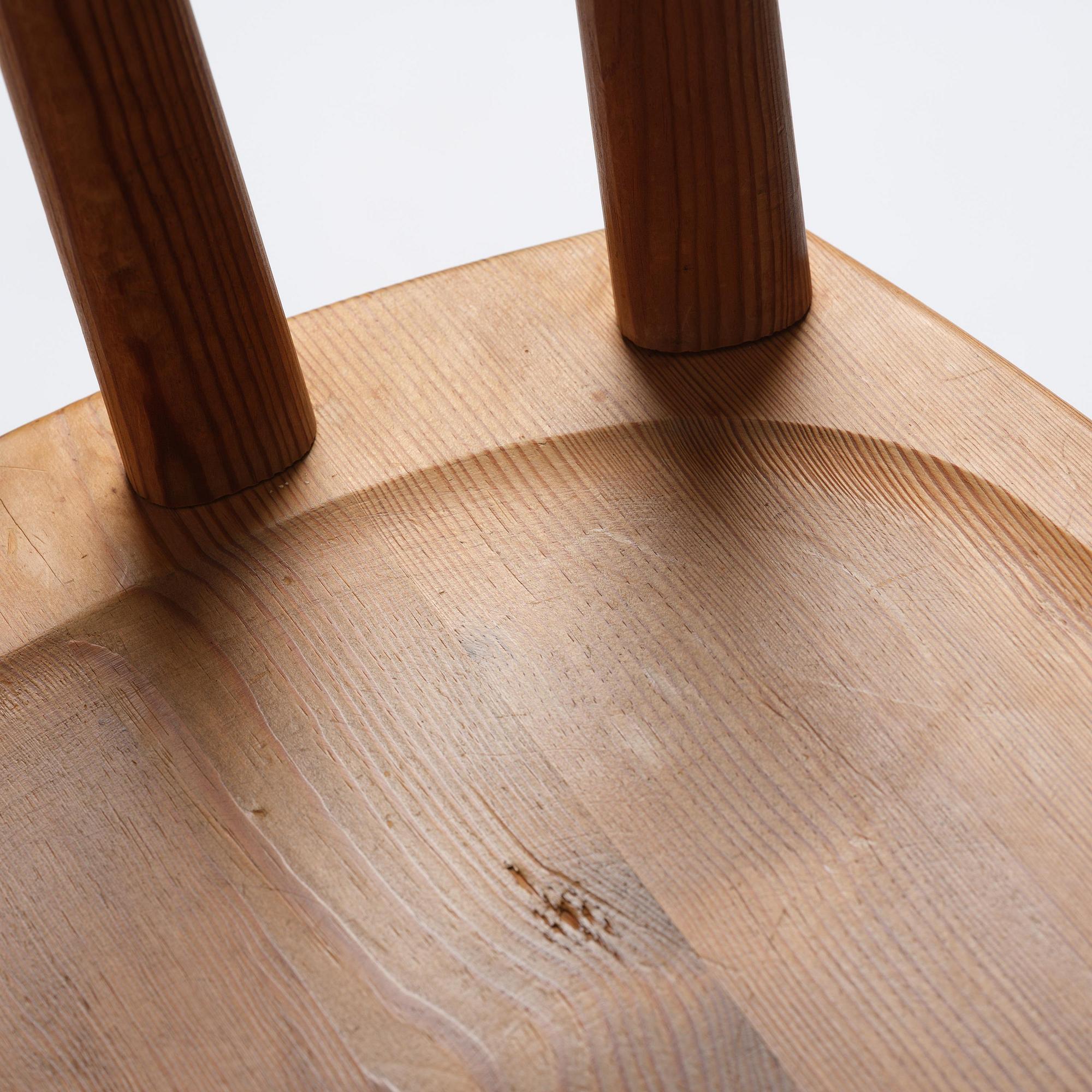 Axel Einar Hjorth, a set of six stained pine "Utö" chairs, Nordiska Kompaniet, Sweden, 1930s.