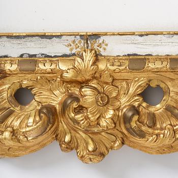 A giltwood rococo mirror, Stockholm, later part 18th century.