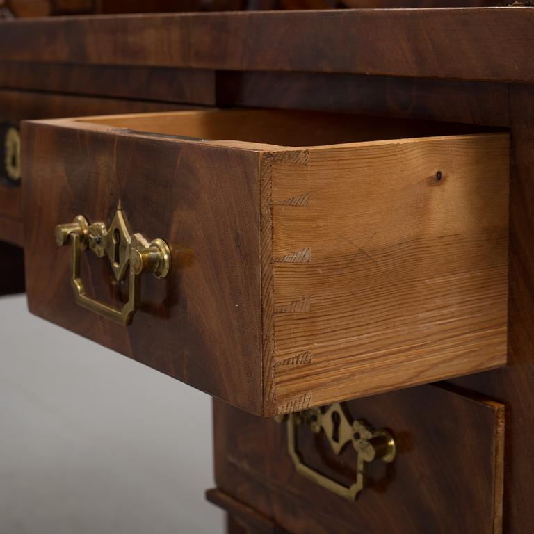 A  mahogany empire dressing 19th century table with mirror.