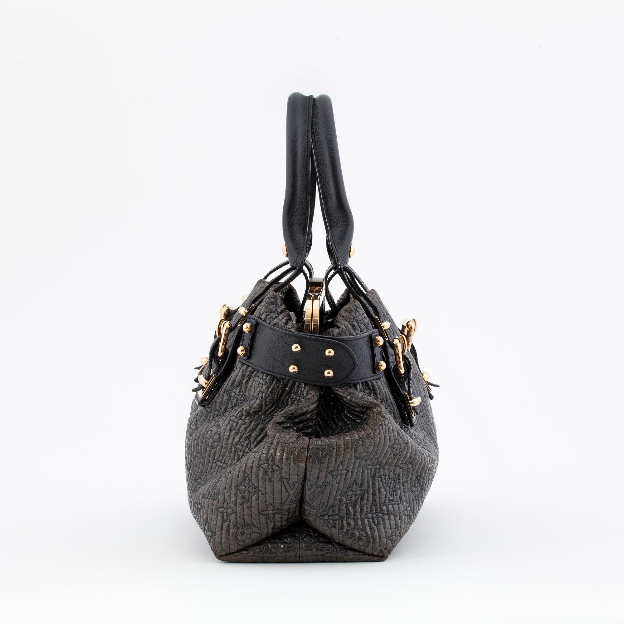 LOUIS VUITTON, a maroon "Monogram Motard Biker" shoulder bag.