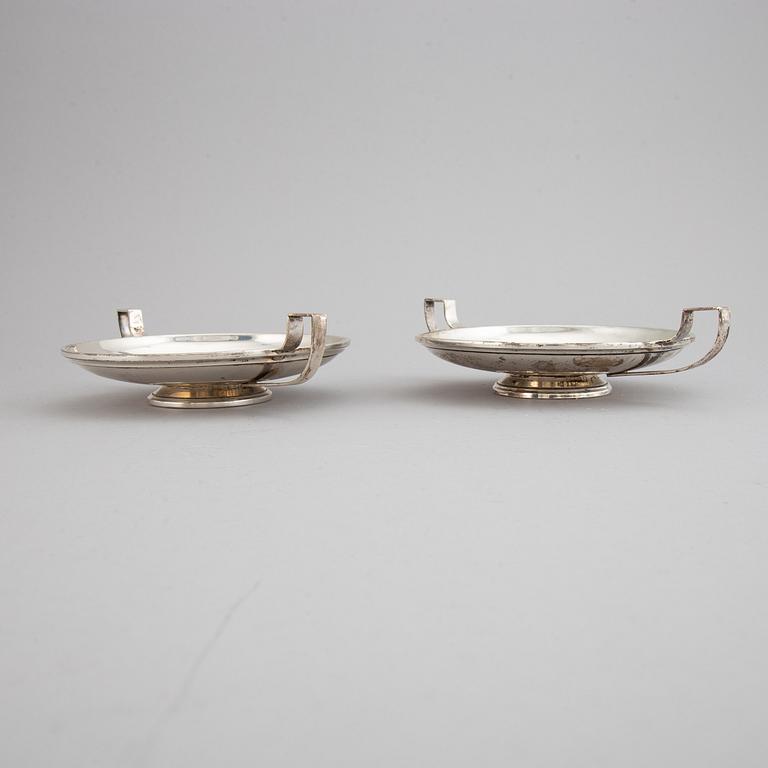 A pair of sterling silver tazzaz.