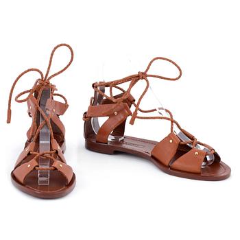 406. RALPH LAUREN, a pair of brown leather sandals. Size 39.
