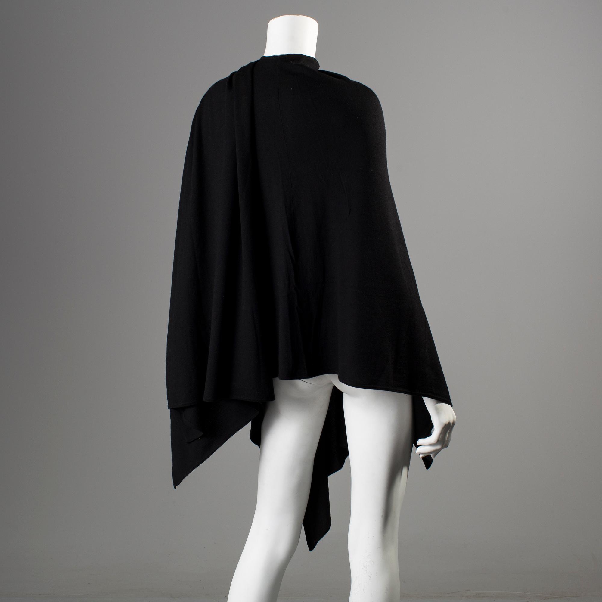 A black cottonponcho by Ralph Lauren.