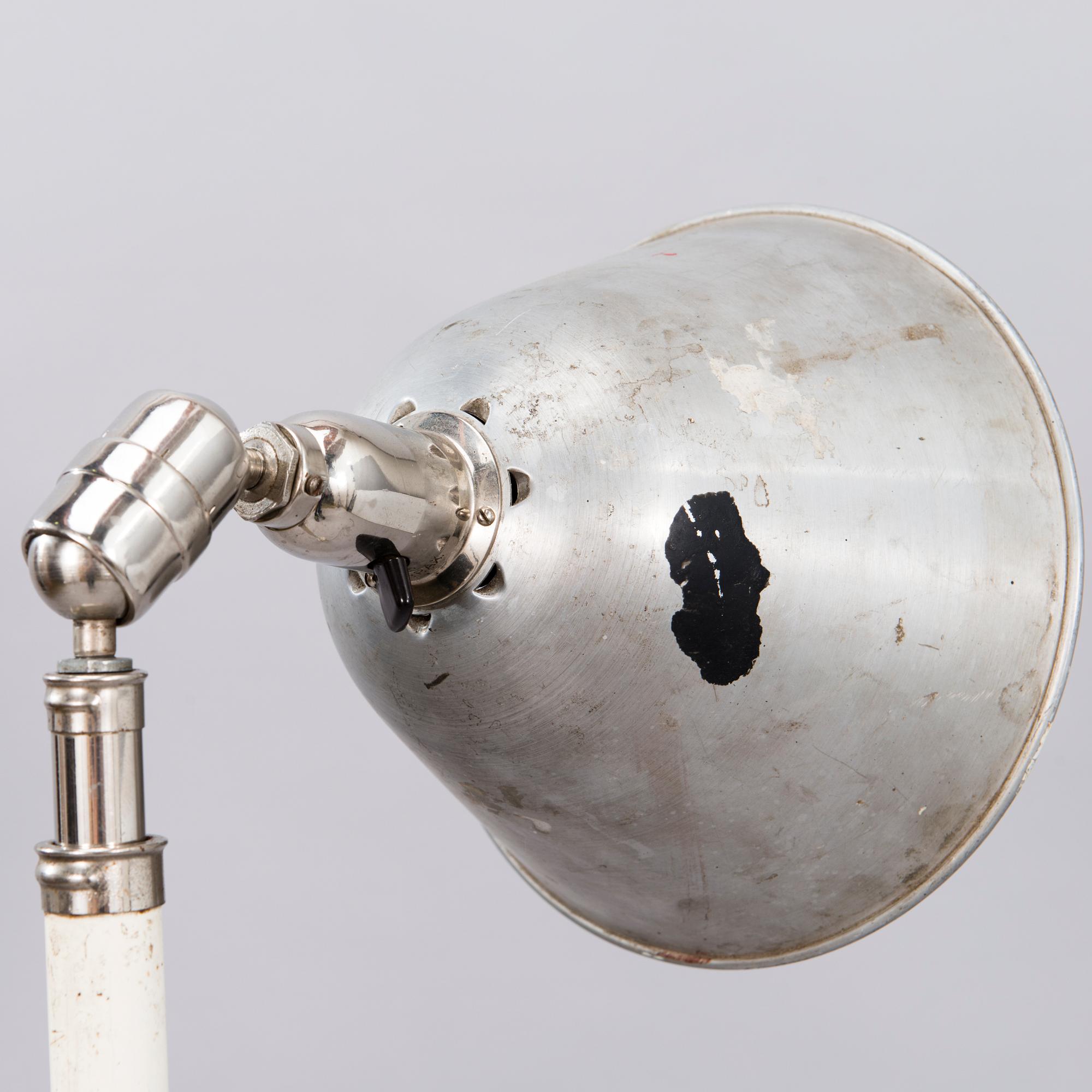 JOHAN PETTER JOHANSSON, A mid-20th century Swedish industrial light 'Triplex-pendel'.