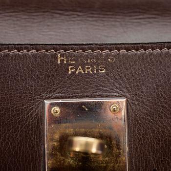 HERMÈS, a brown calf leather "Kelly 32" bag from the 1960s.