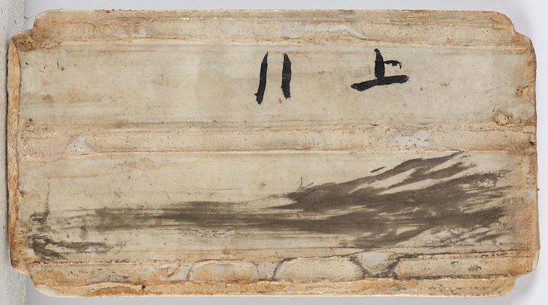 A set with four Chinese porcelain panels with a wooden frame, first half of 20th century.
