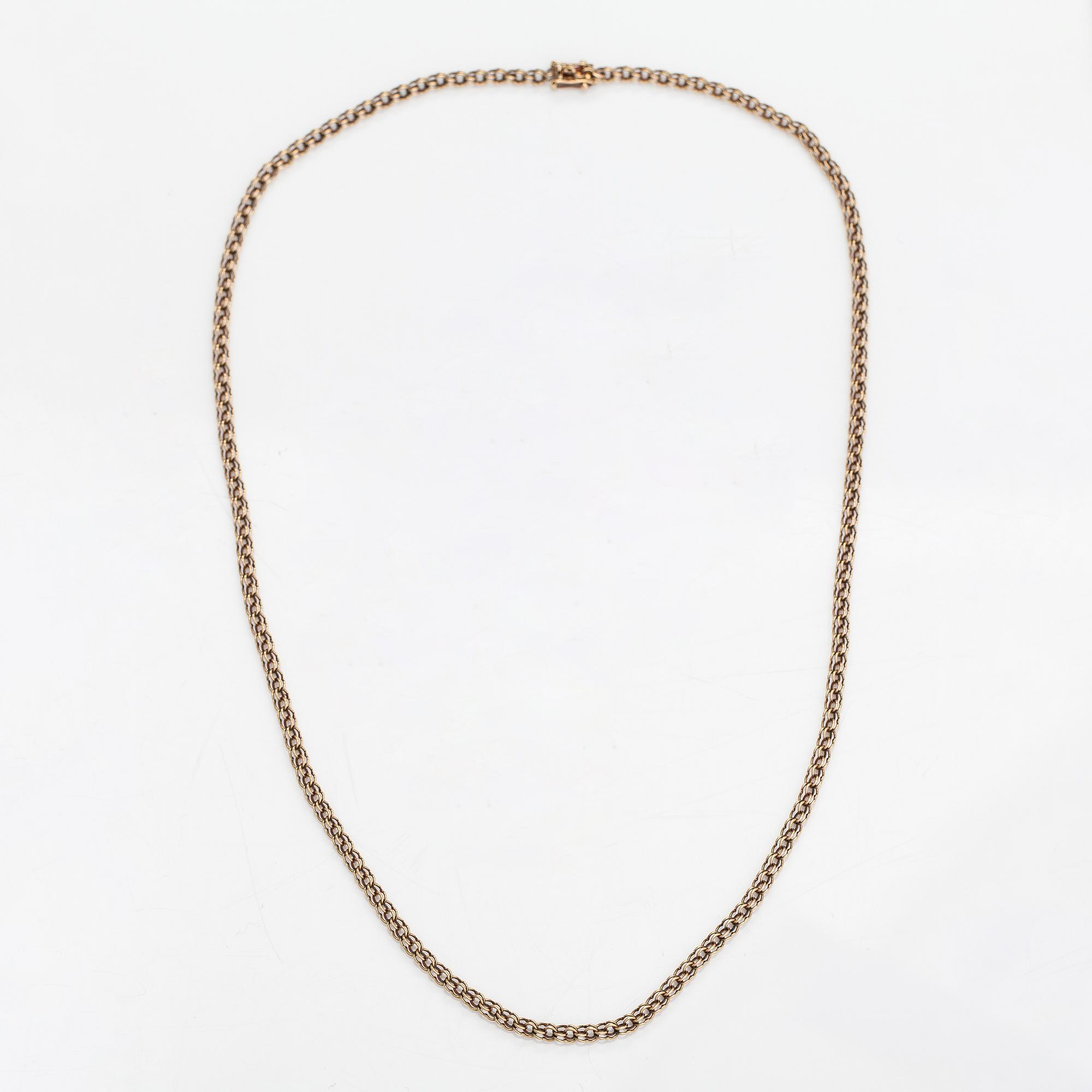 A 14K gold necklace. Aittamäki Ky, Nurmisjärvi 1992.