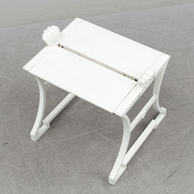 A "Sneckan" bench by Folke Bensow for Byarums bruk in the late 20th century.