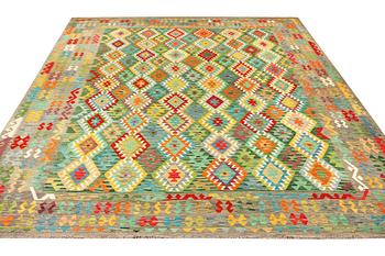 A Kilim carpet, c. 403 x 305 cm.