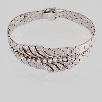 ARMBAND, 18K vitguld med briljant och åttkantslipade diamanter ca 1.30 ct. Vikt 54,5 gram.