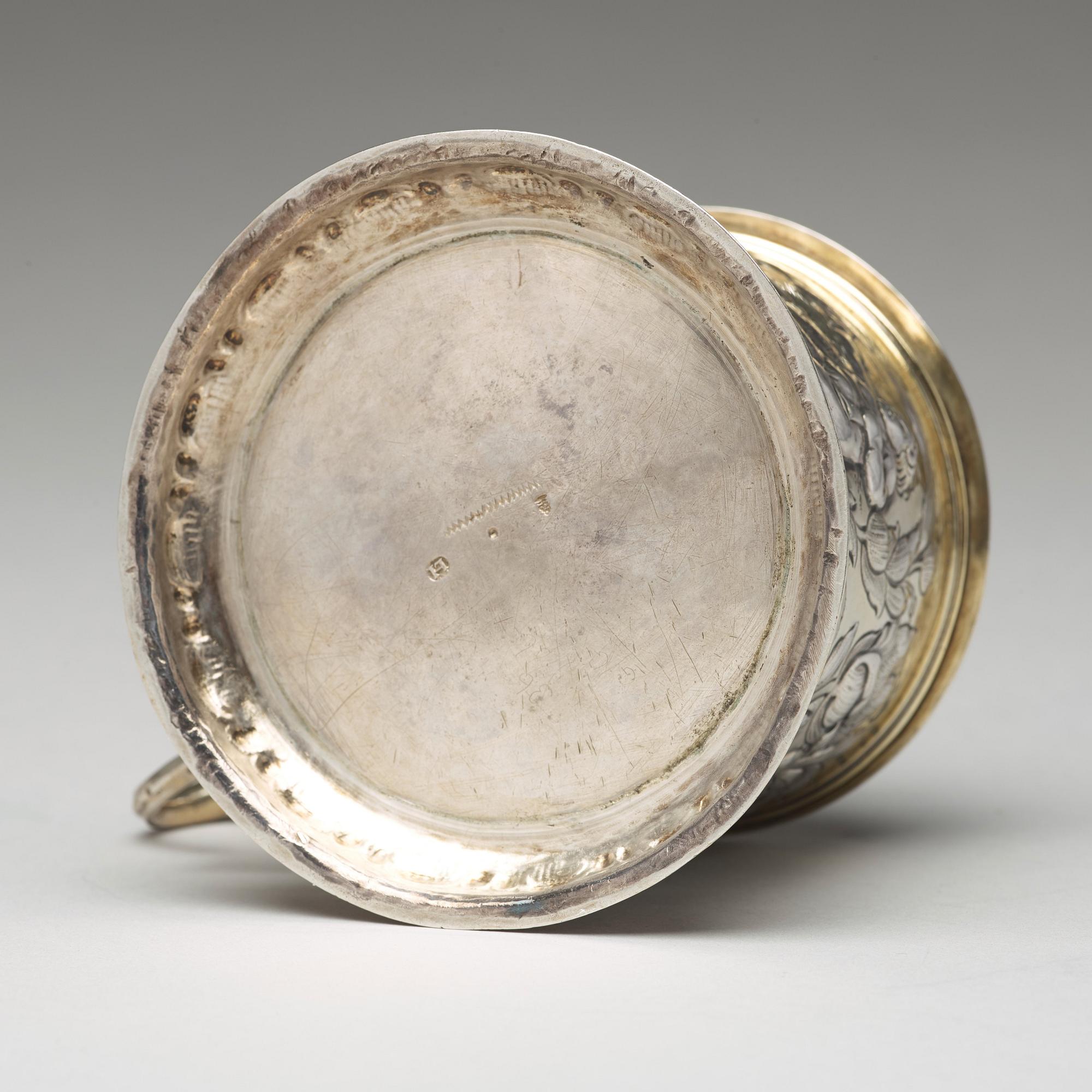 A German 17th century parcel-gilt silver tankard, mark of Hans Leonhard Huber, Augsburg (1637-1671).