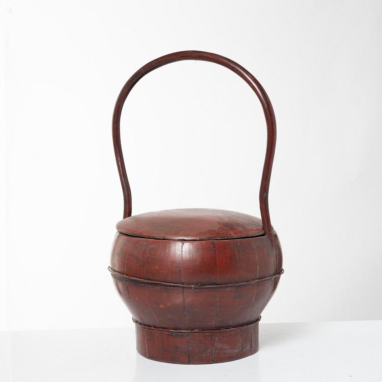 A group of three red wooden vessels, China/Southeast Asia, 20th century.