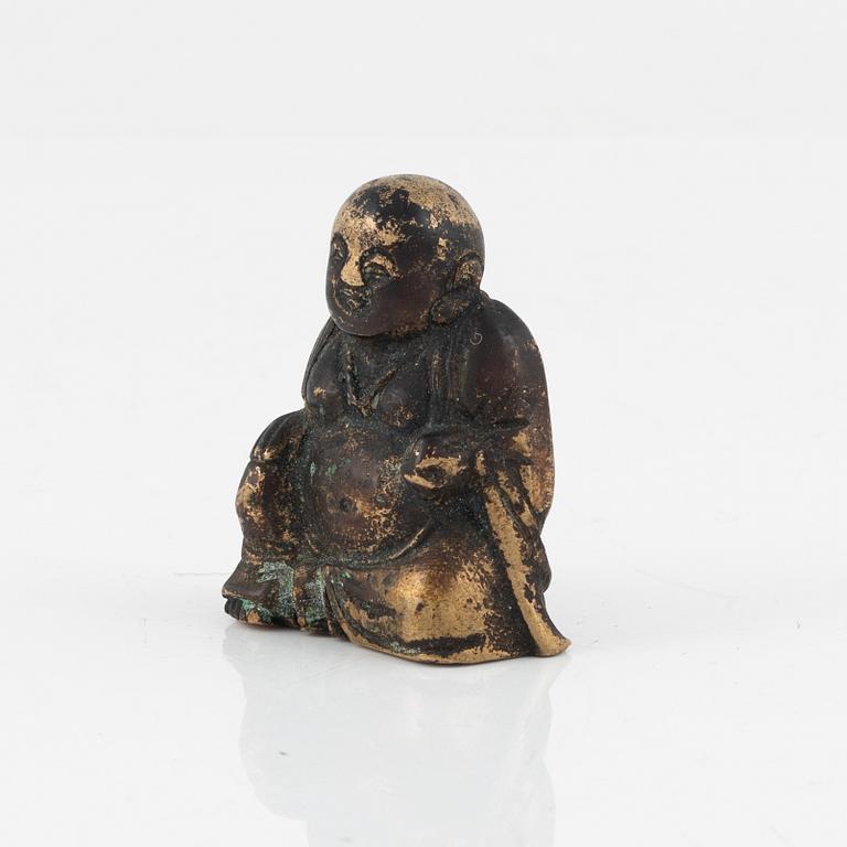 A bronze scultpure/scroll weight, Qing dynasty, 19th Century.