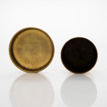 Maija Heikinheimo, a set of two mid-20th century brass jars, manufacturer Valaistustyö for Artek.