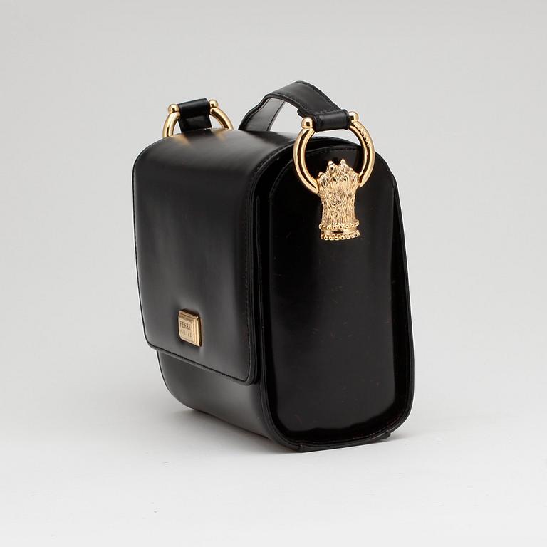 GIANFRANCO FERRÉ, a black leather shoulder bag.