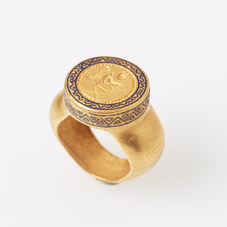 A modern Byzantine-style gold and enamel signet ring.