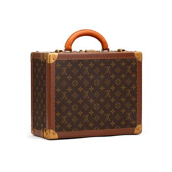 423. LOUIS VUITTON, a monogram canvas suitcase, "Le Loziné".