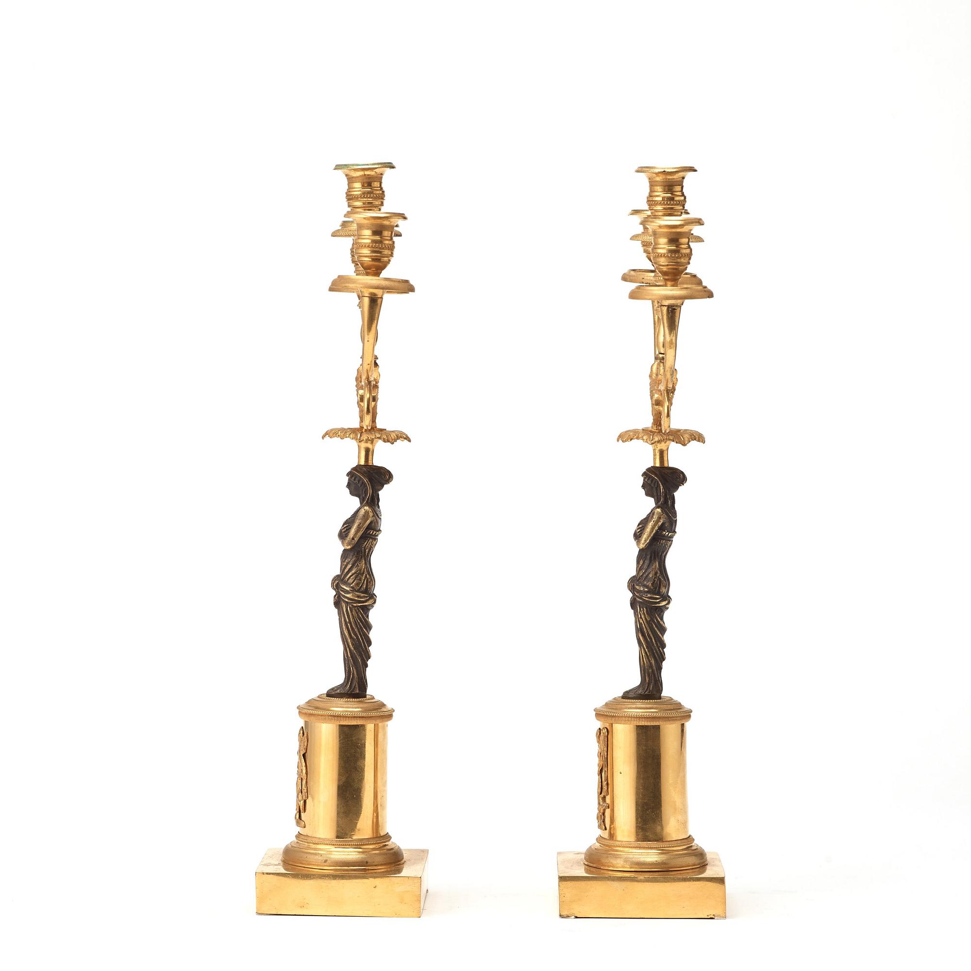 A pair of late Gustavian circa 1800 three-light candelabra.