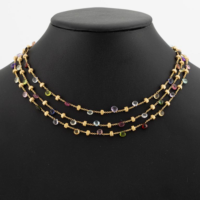 Marco Bicego a three strand necklace in 18K gold with coloured stones.