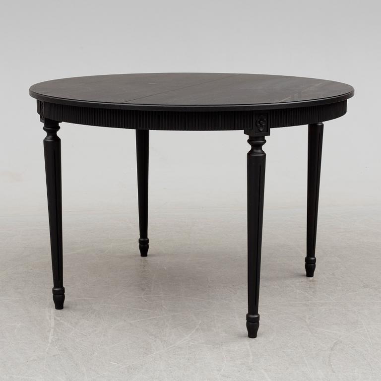 A second half of the 20th century Gustavian style dining table.