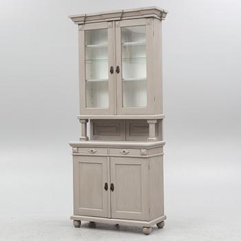 A two-part cabinet, around 1900.