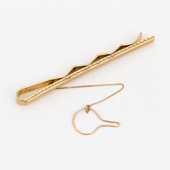 18K gold tie-clip.