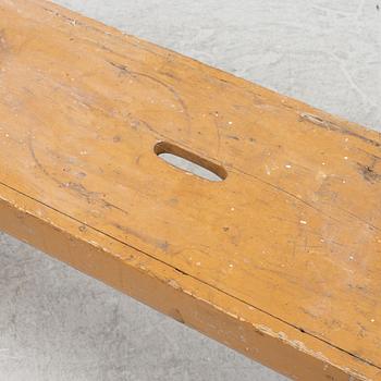 A painted bench, circa 1900.