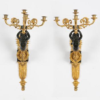 A pair of Empire style appliques, circa 1900.