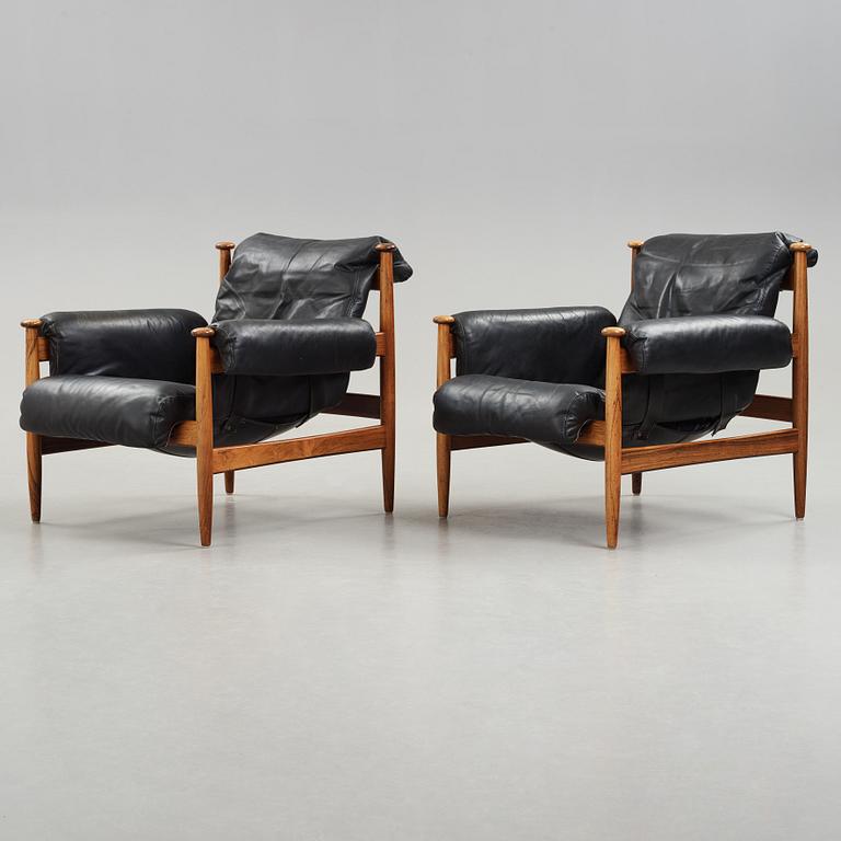 A pair of 'Amiral' easy chair by Eric Merthen.