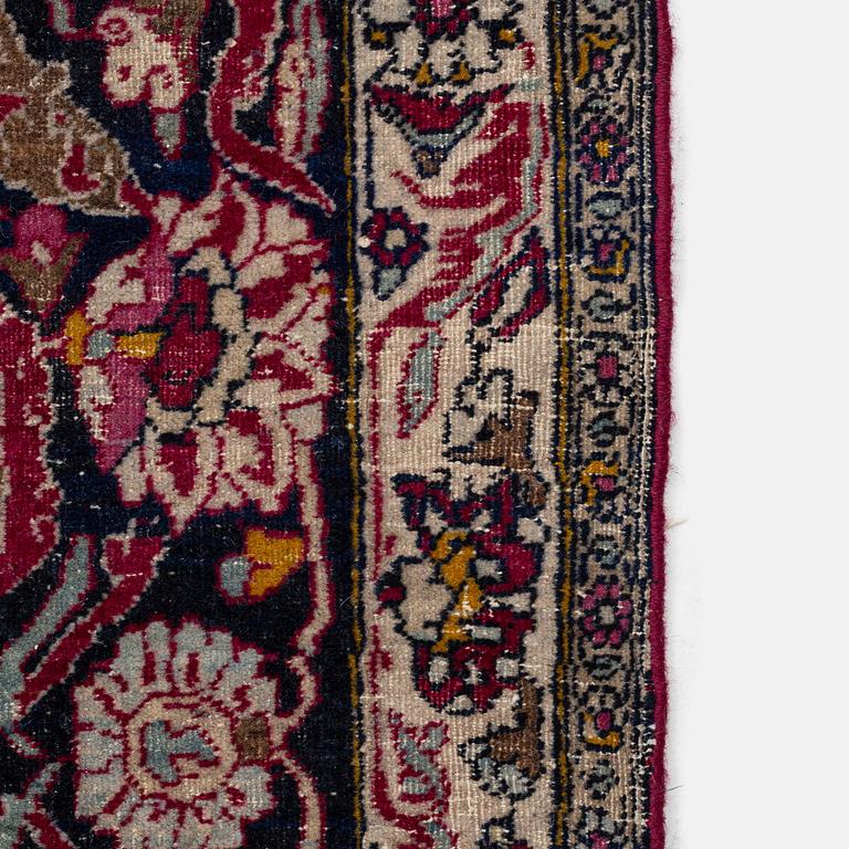 An antique Isfahan carpet, circa 342 x 250-260 cm.
