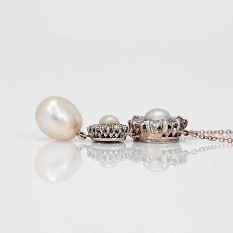 A natural pearl and old-cut diamond necklace.