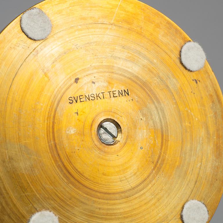 FIRMA SVENSKT TENN, a pair of Swedish 20th century  brass candlesticks marked Svenskt Tenn.