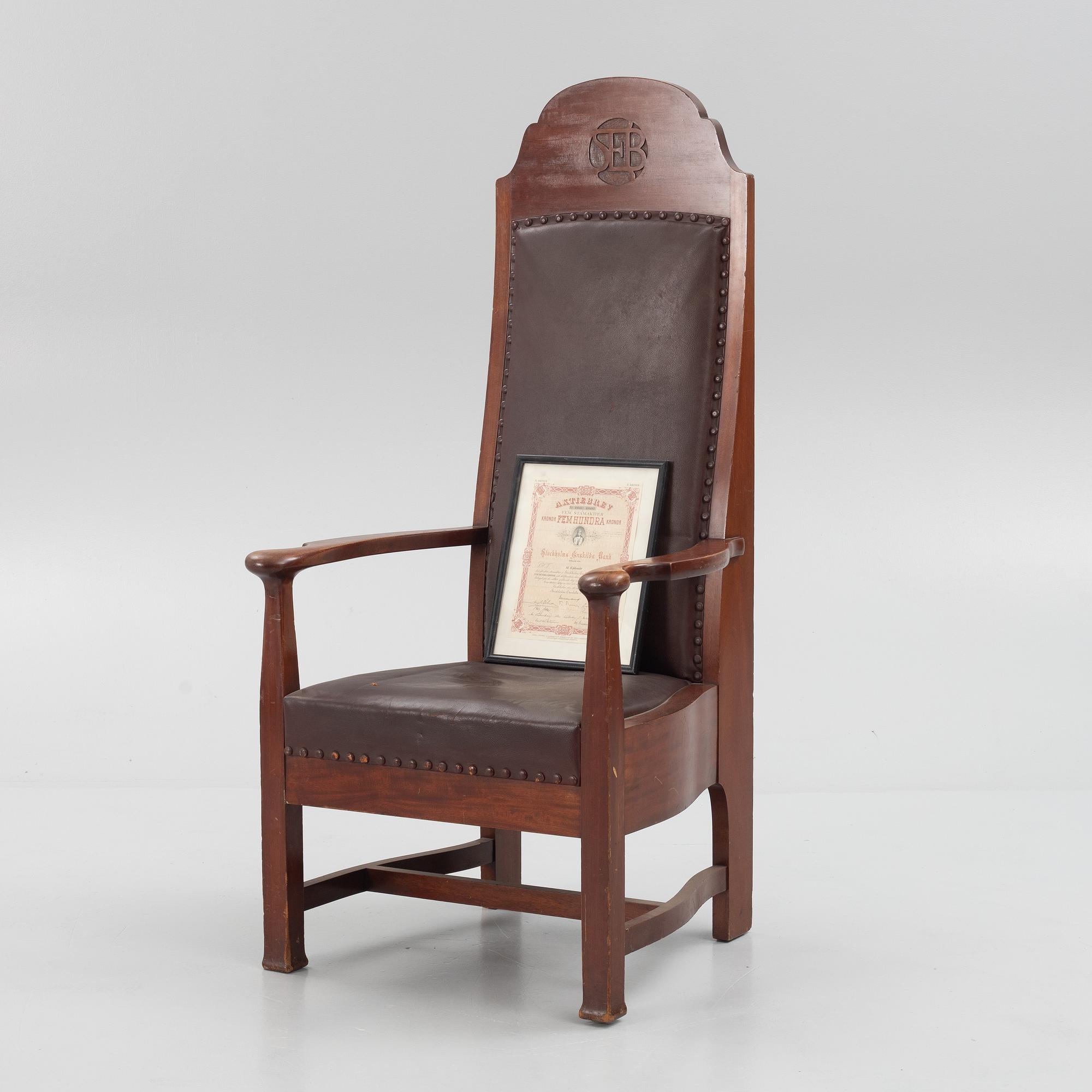Ordförandestol, "SEB", utförd till Stockholms Enskilda Bank, signerad och daterad 1907.