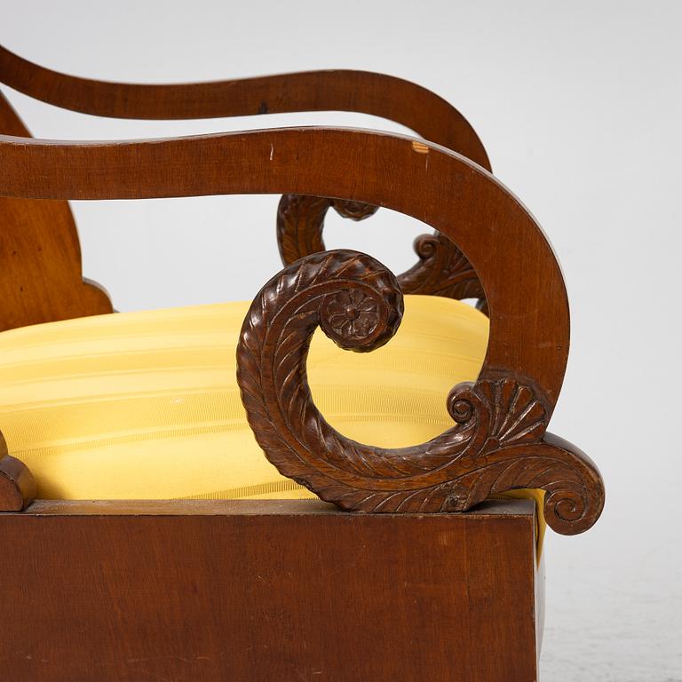 A pair of Russian/Baltic Empire mahogany armchairs, 1830's/40's.