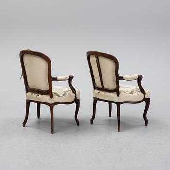 Two mid 18th century French Louis XV armchairs.