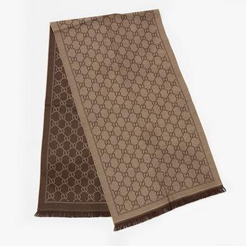 Gucci, a wool 'GG Jaquard Knitted Scarf'.