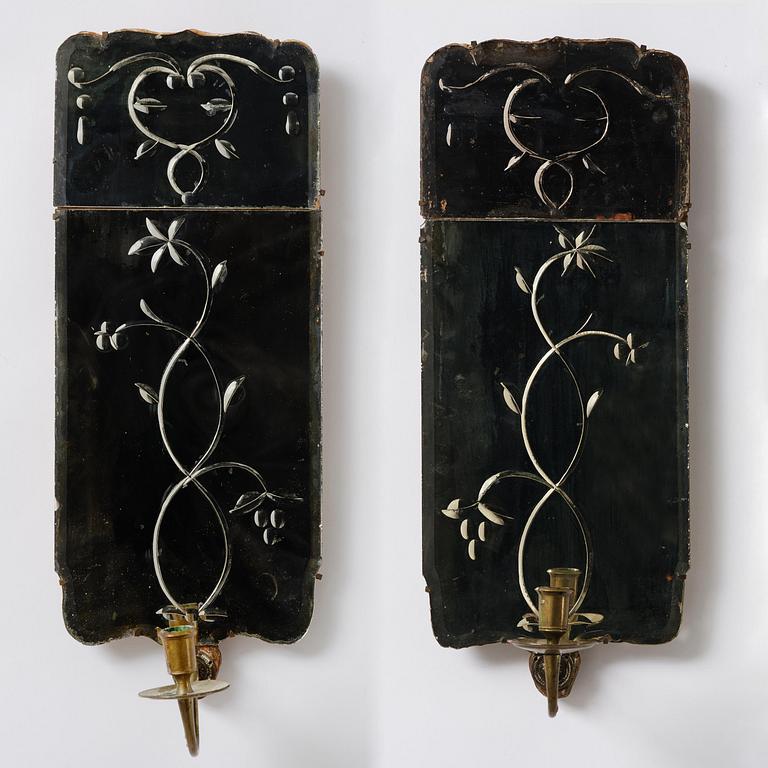 A pair of Swedish engraved-glass one-branch girandole mirrors, later part 18th century.