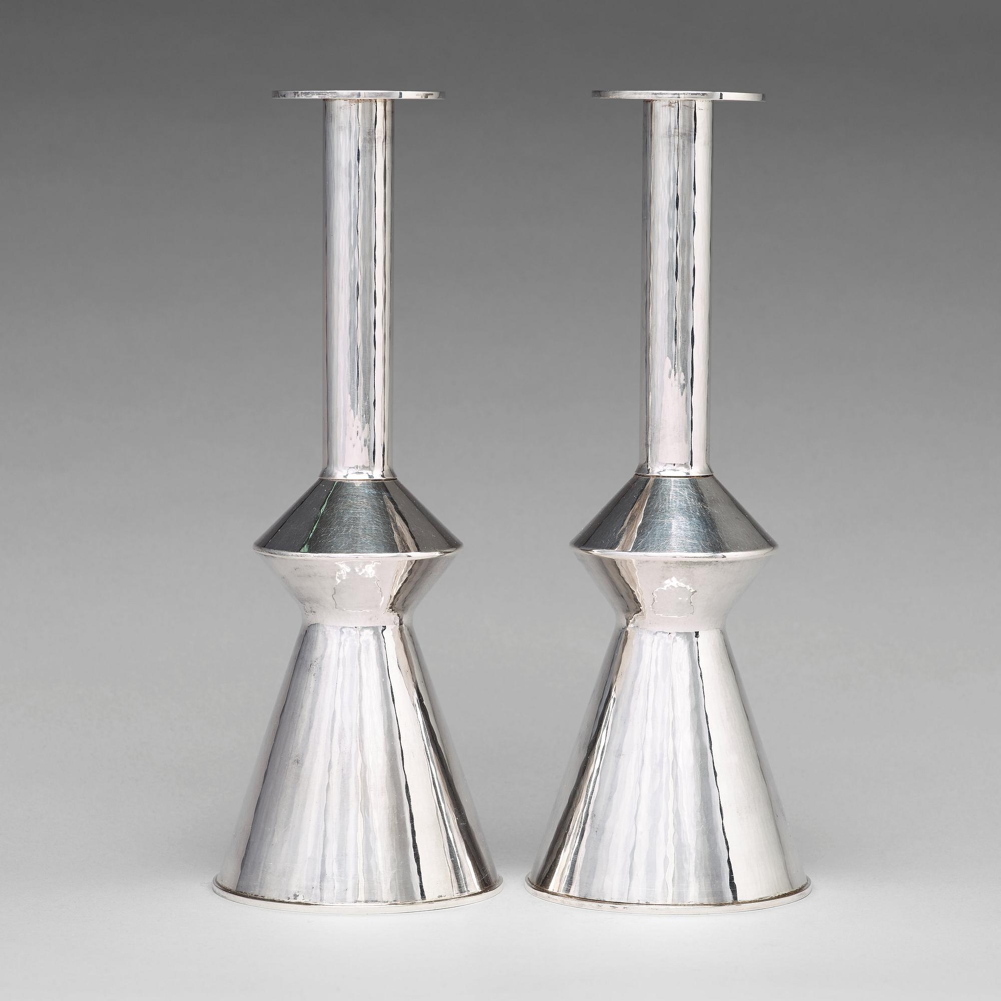 Sigurd Persson, a pair of sterling silver candlesticks, executed by the silversmith Johann Wist, Stockholm 1970.