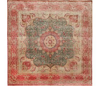 A silk Quum rug, c. 244 x 273 cm.